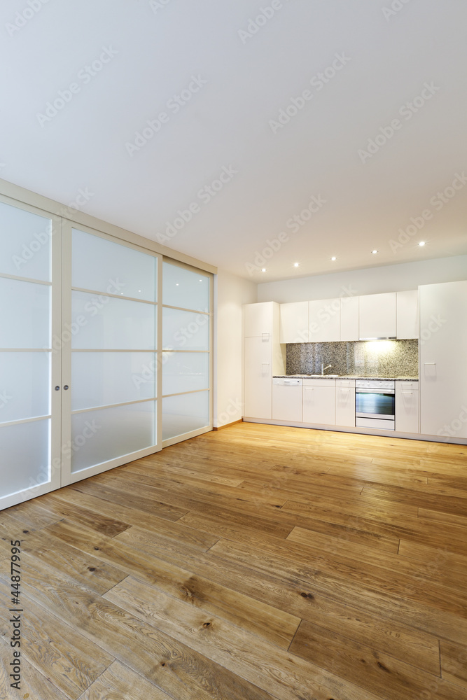 Obraz premium interior empty house with wooden floor, kitchen