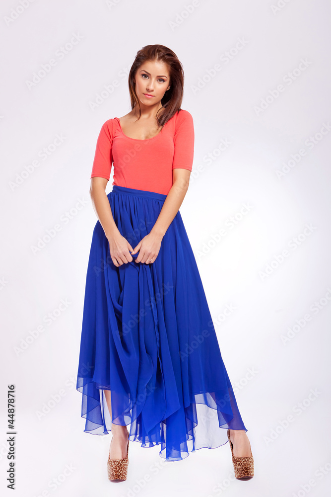 beautiful young woman in blue long dress beautiful young woman in blue long dress