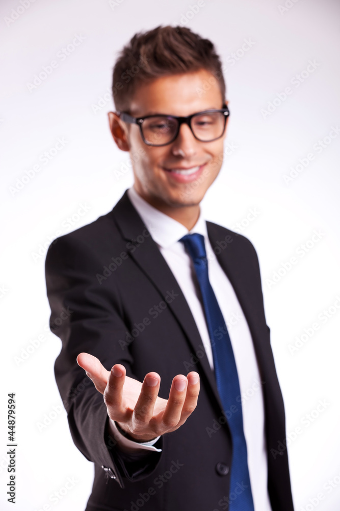 business man holding something on his hand business man holding something on his hand