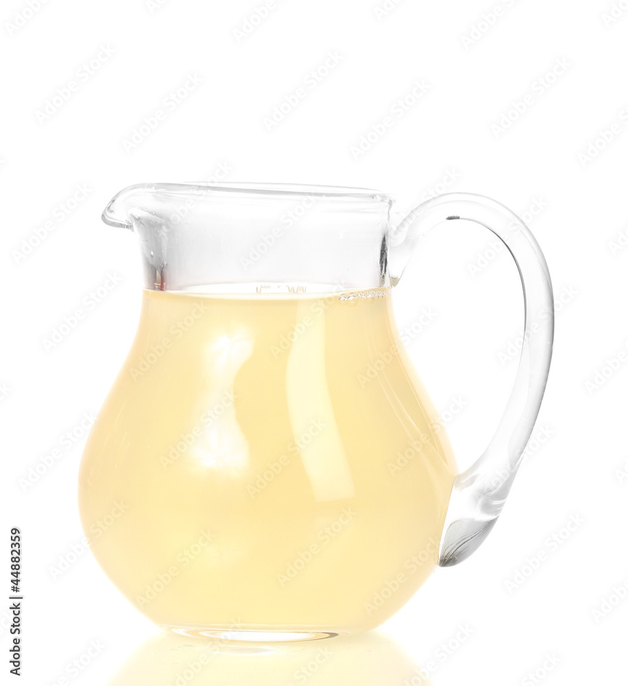 Tropical juice in glass pitcher isolated on white Tropical juice in glass pitcher isolated on white