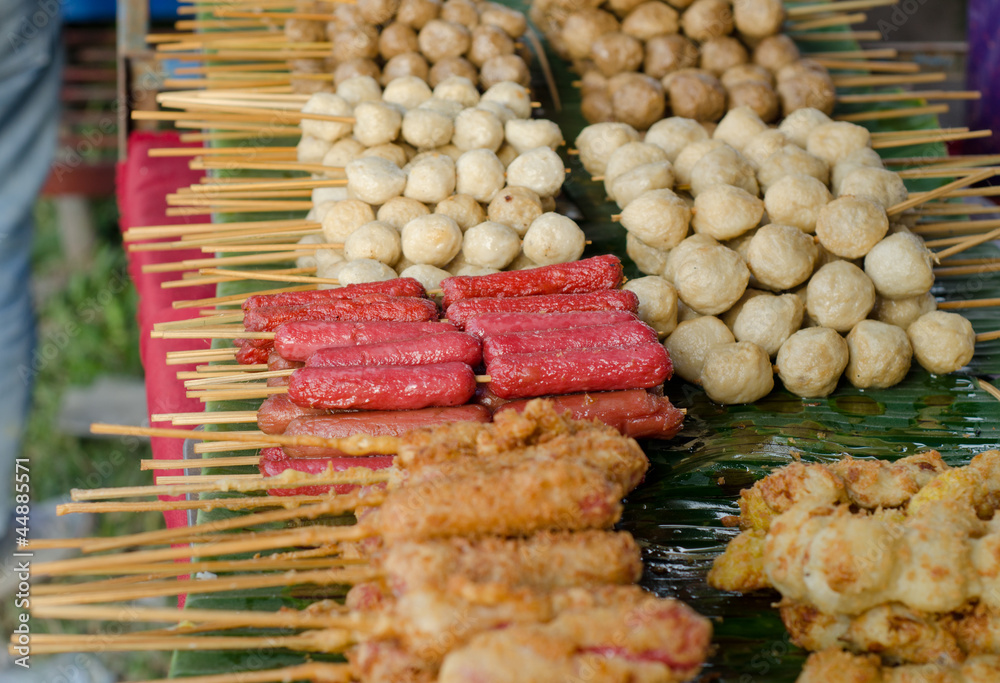meatballs and hotdog fried , thai street  food