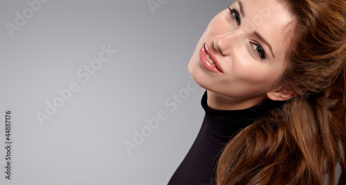 young brunette woman beauty portrait studio shot