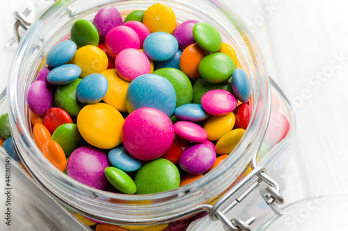 colored candy in glass jar