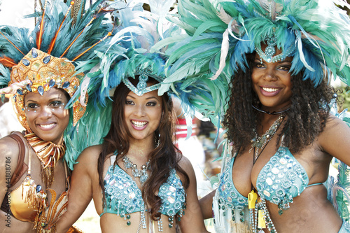 Obraz na plátně Beautiful women in sparkling Caribana parade costume