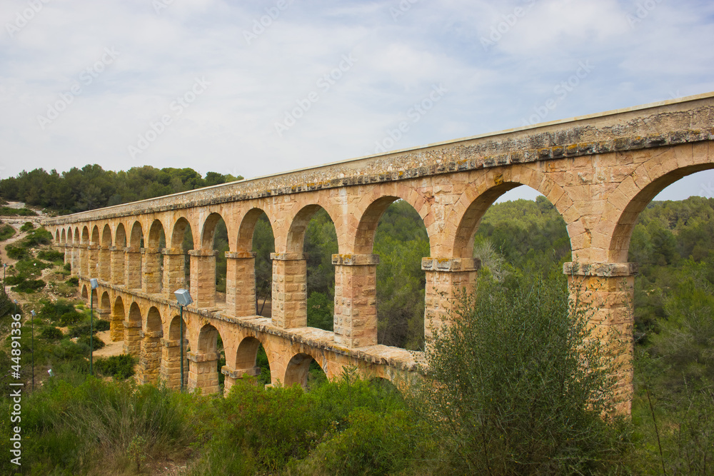 Beautiful view of roman Aqueduct Pont del Diable in Tarragona
