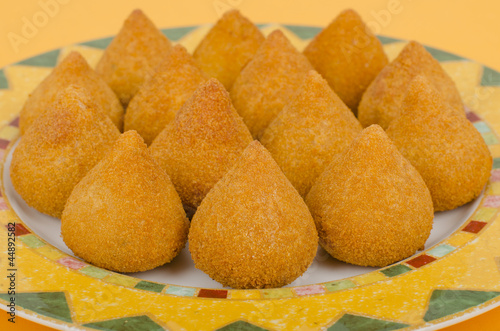 Coxinha: Brazilian deep fried snack filled with shredded chicken