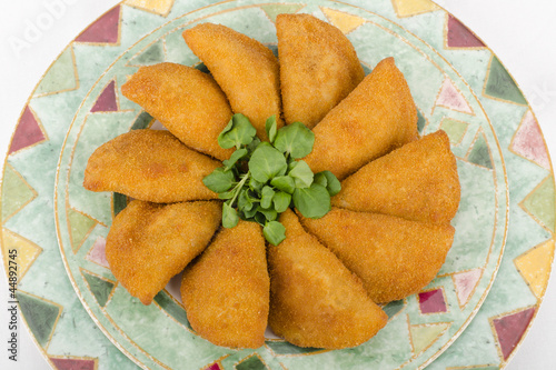 Rissole - Chicken and cheese rissoles on a white background photo