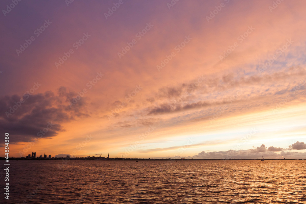 silhouette of tallinn with fire sunset silhouette of tallinn with fire sunset