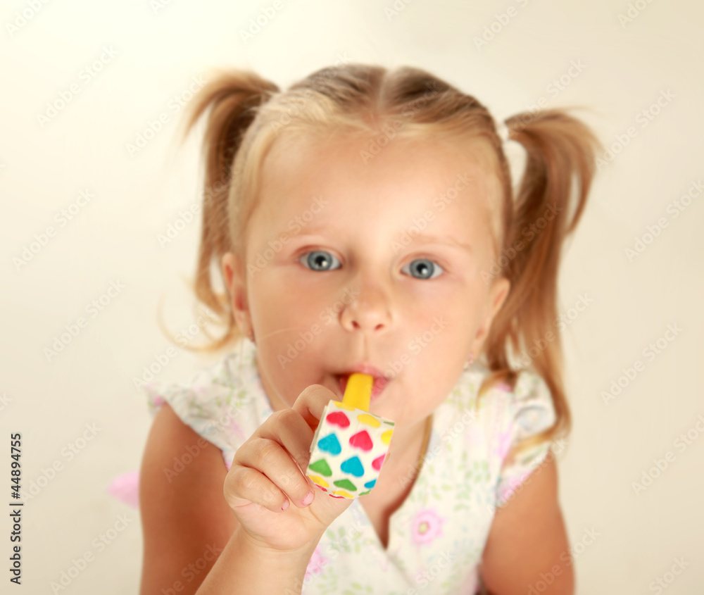 Happy children with birthdaywhistle on white background Happy children with birthdaywhistle on white background