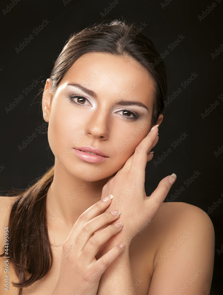 Portrait of young woman with healthy skin touching Portrait of young woman with healthy skin touching