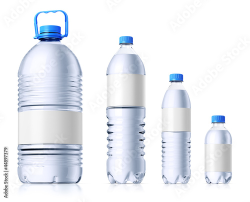 Group of plastic bottles with water. Isolatedon white.
