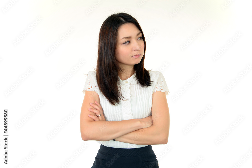 不快な表情を浮かべる女性+OL 不快な表情を浮かべる女性+OL