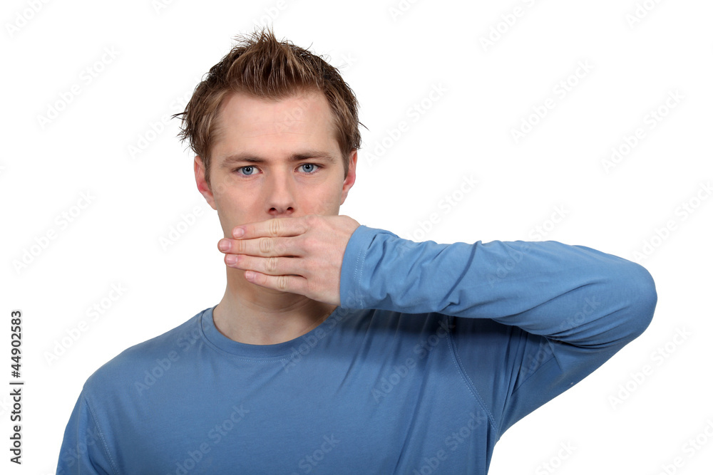 Man with hand on mouth Man with hand on mouth