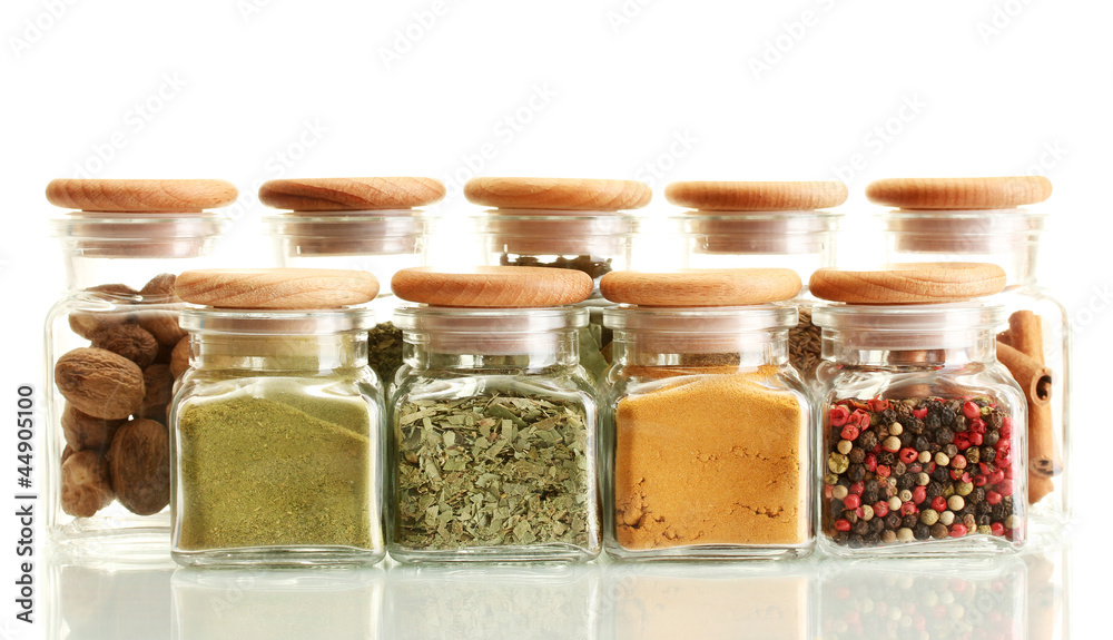 powder spices in glass jars isolated on white powder spices in glass jars isolated on white