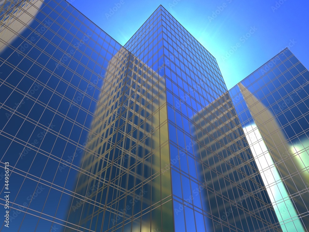 a facade of office to sue reflecting a blue sky