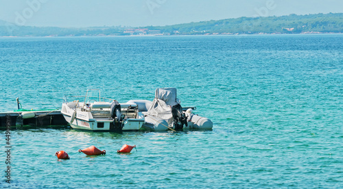 rubber dinghy and boat © Gabriele Maltinti