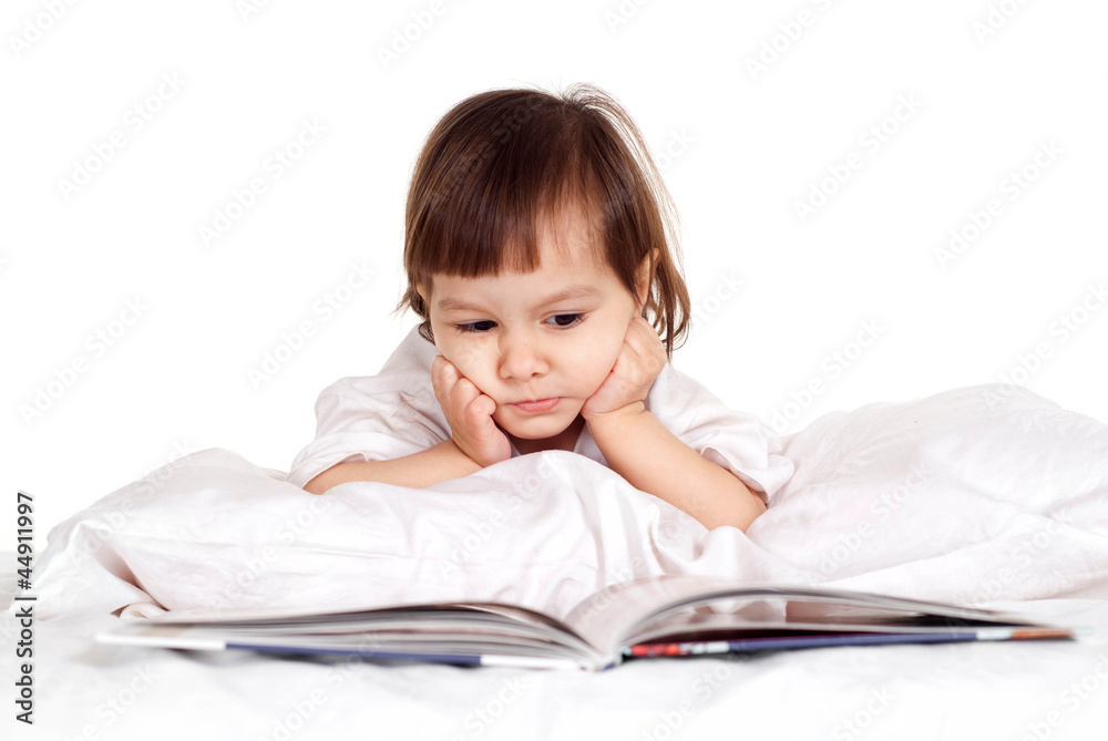 Pretty Caucasian little girl with a book Pretty Caucasian little girl with a book
