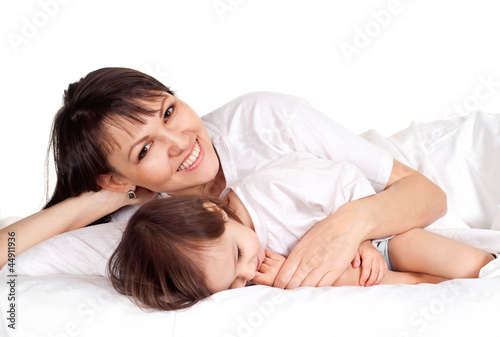 Wallpaper Mural A beautiful smile Caucasian mother with her daughter lying Torontodigital.ca