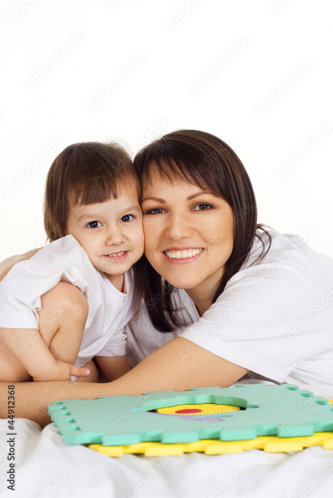 A beautiful Caucasian miss with his mama