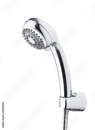 Metallic chrome shower head on white background