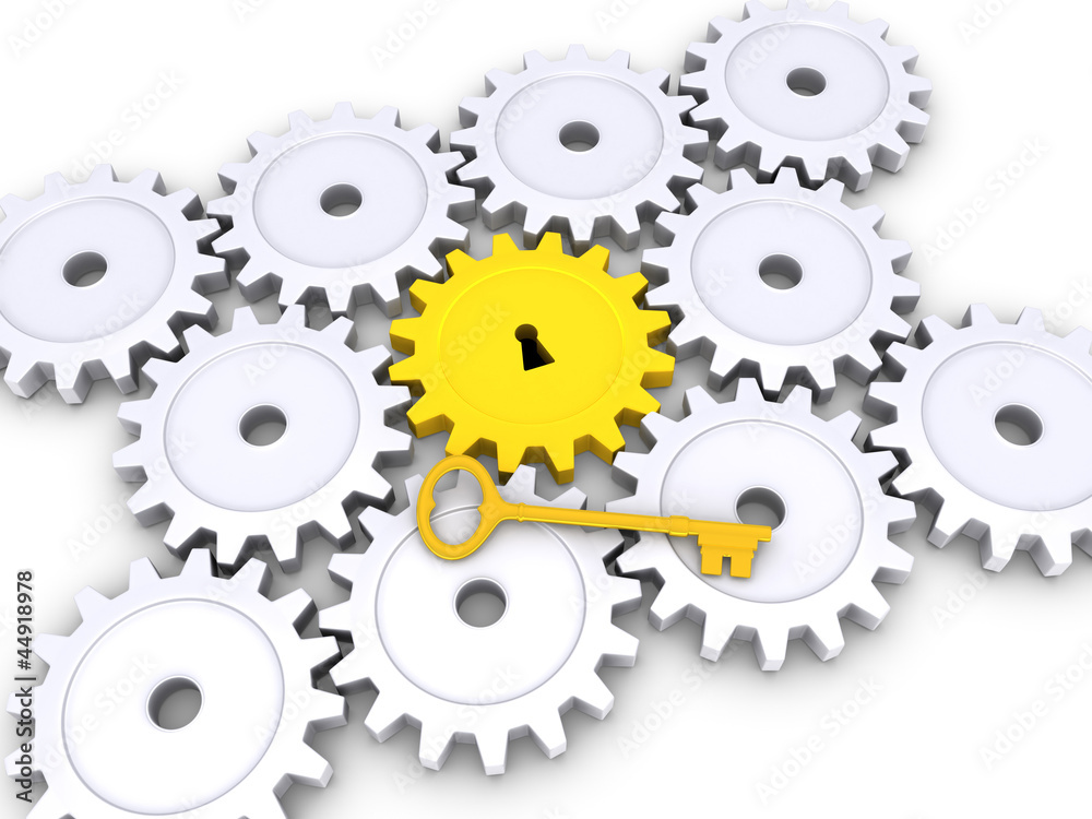 Golden key with cogwheels on the ground Golden key with cogwheels on the ground
