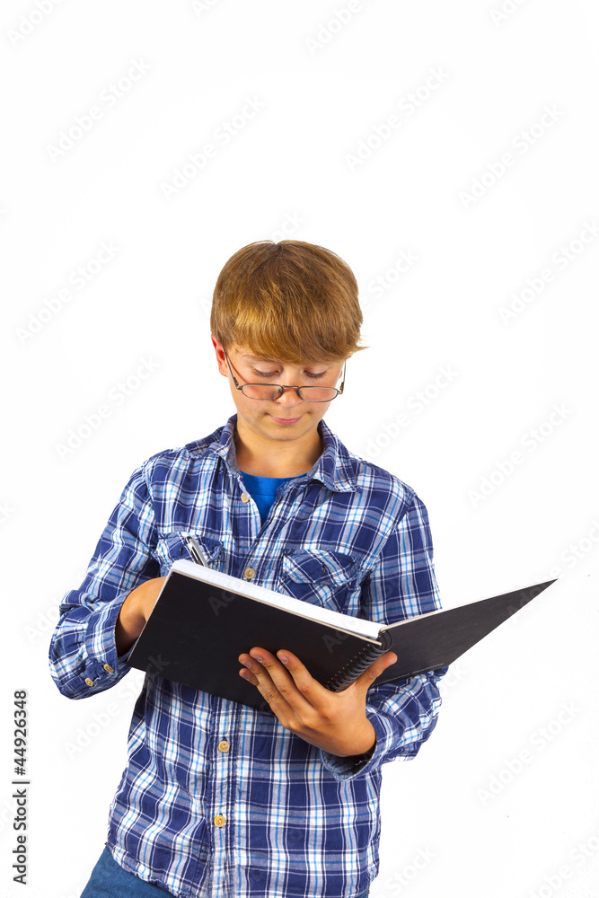 happy smart boy is reading in a book happy smart boy is reading in a book