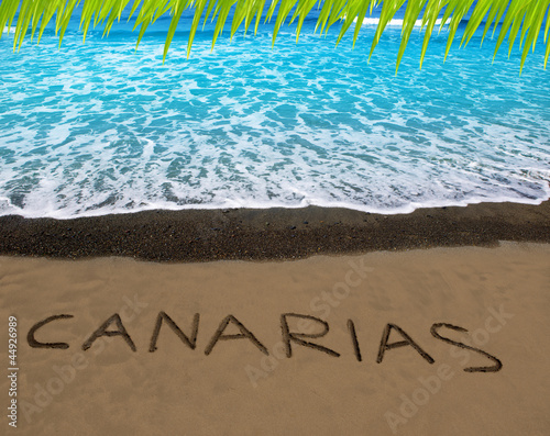 Brown beach sand with written word Canarias