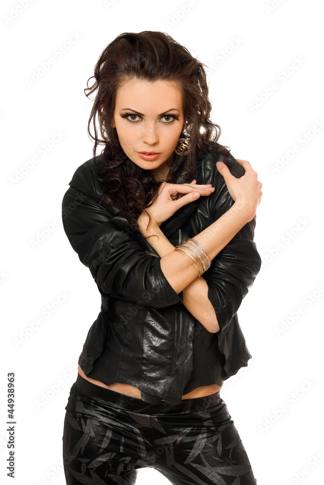 Portrait of sexy young brunette in black clothes. Isolated Portrait of sexy young brunette in black clothes. Isolated