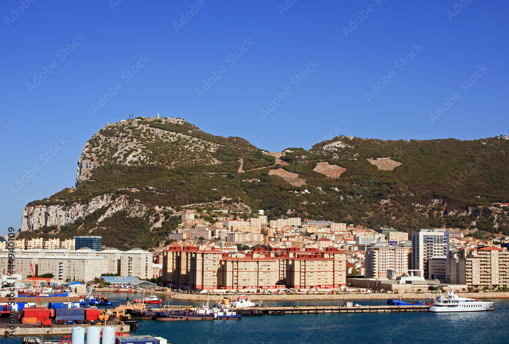 Gibraltar Waterfront.  Gibraltar is a British territory located to the south of the Iberian Peninsula at the entrance to the Mediterranean Sea.  The land is one of the most southerly points in Europe.