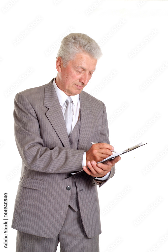 Writing elderly man in suit Writing elderly man in suit