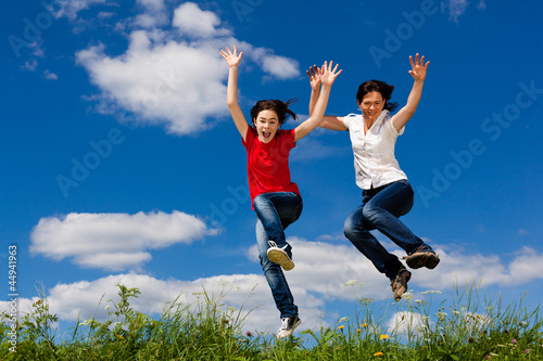 Women running, jumping outdoor