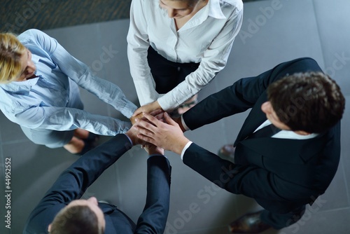 business people group joining hands