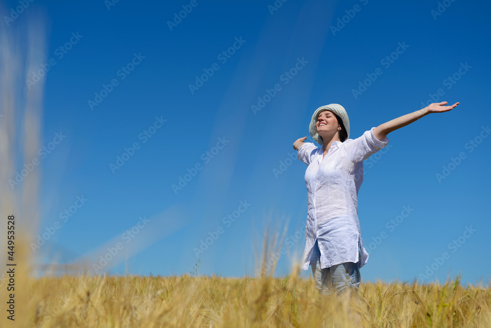 young woman in wheat field at summer young woman in wheat field at summer