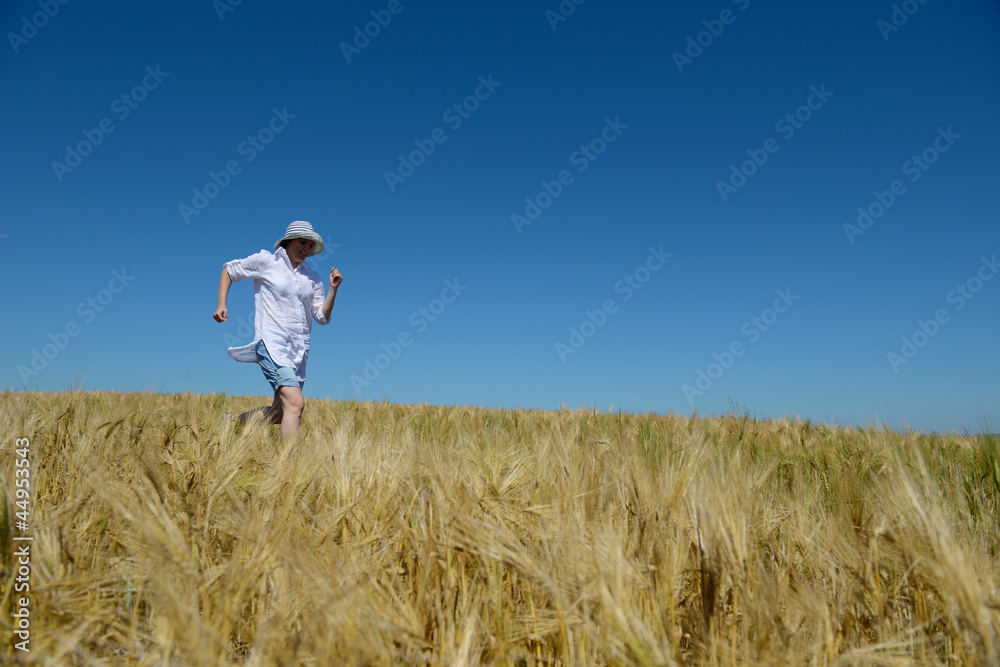 young woman in wheat field at summer young woman in wheat field at summer