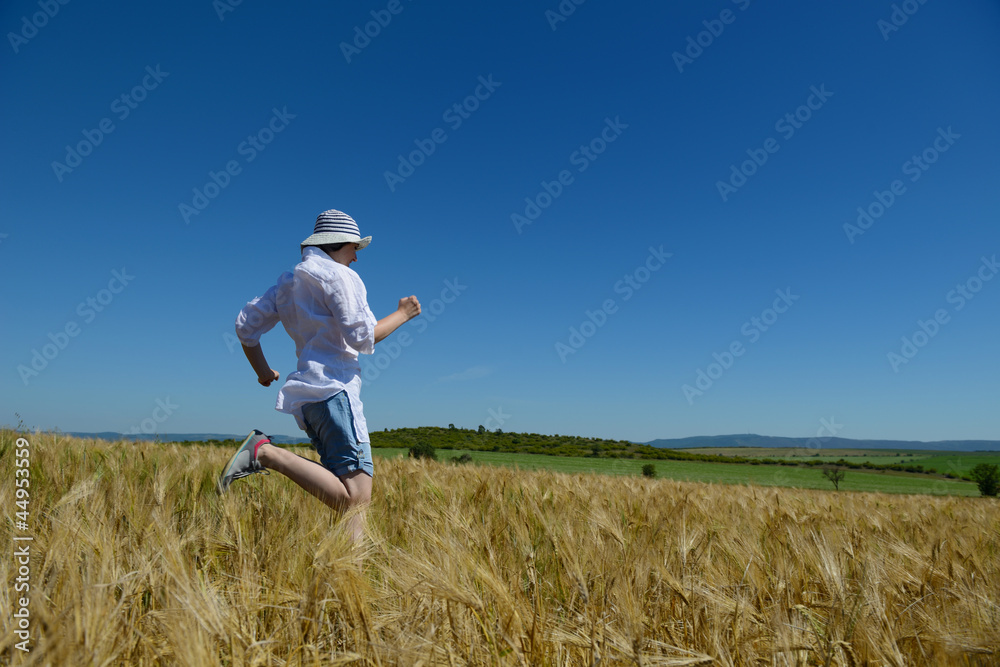 young woman in wheat field at summer young woman in wheat field at summer