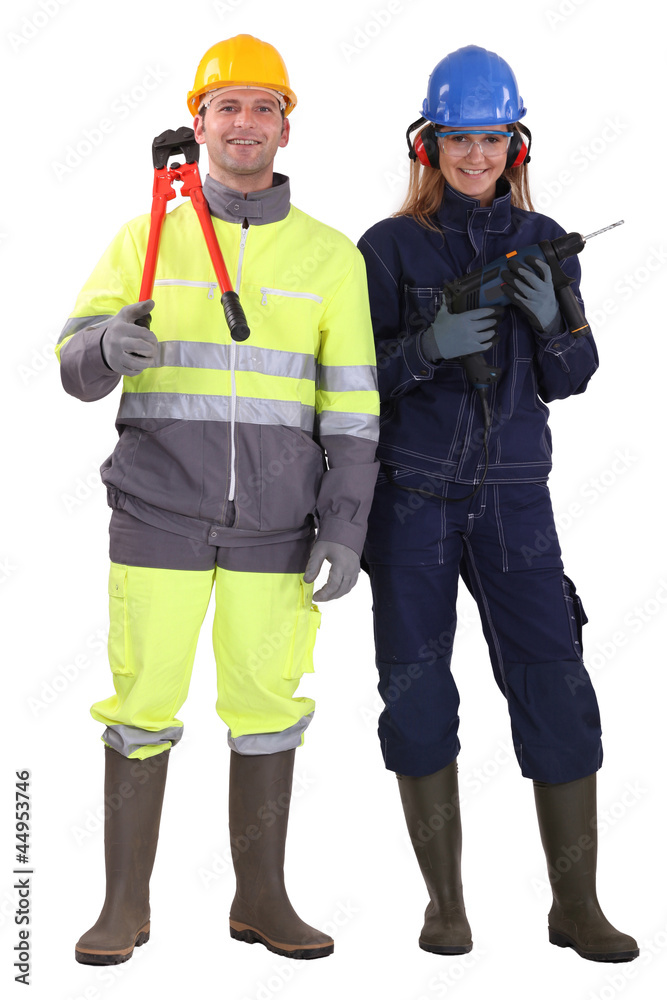 Man and woman with drill and pliers Man and woman with drill and pliers