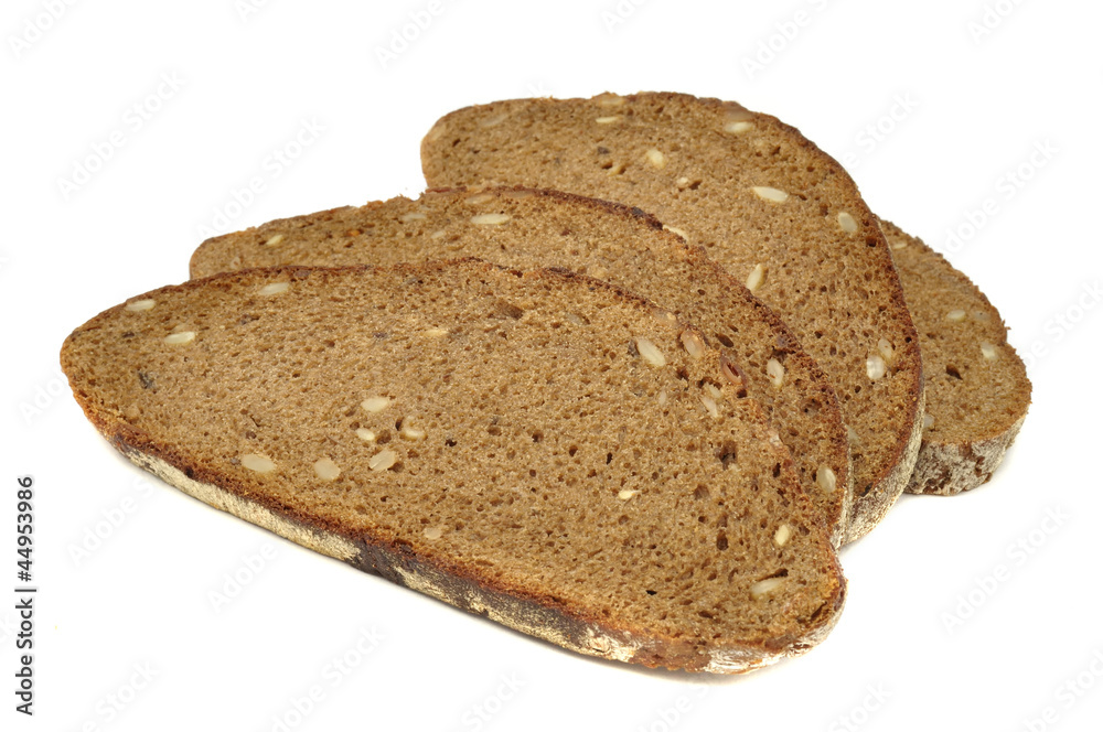 Sliced Brown Bread with Sunflower Seeds Isolated on White Sliced Brown Bread with Sunflower Seeds Isolated on White