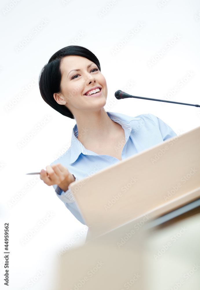 Female presenter at the podium. Business training Female presenter at the podium. Business training