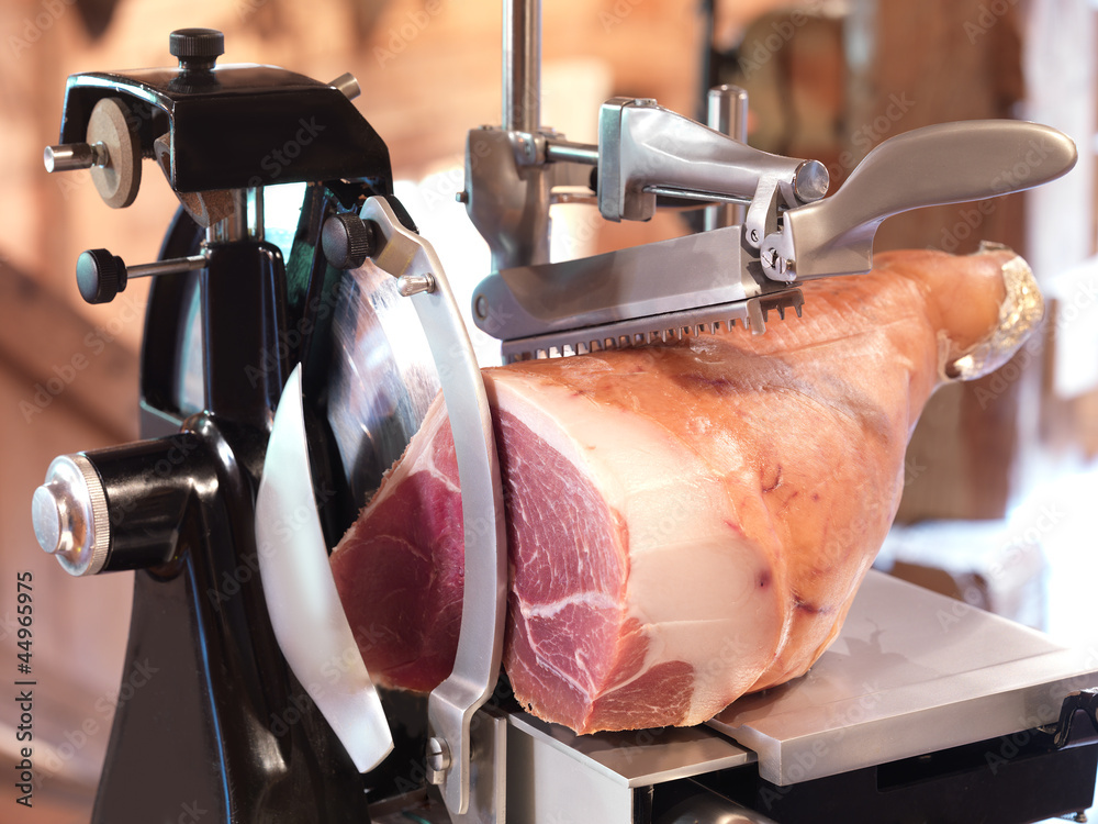 ham in cutting machine, rural