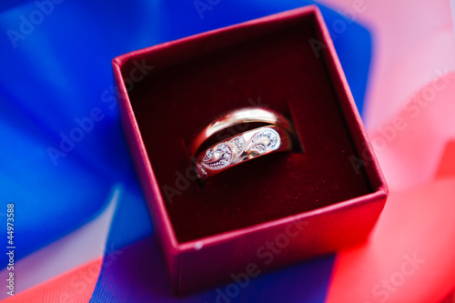 gold wedding rings on the pincushion © p_r_g