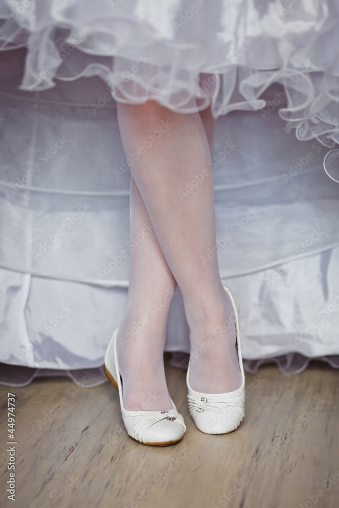 closeup photo of beautiful bride's shoes closeup photo of beautiful bride's shoes