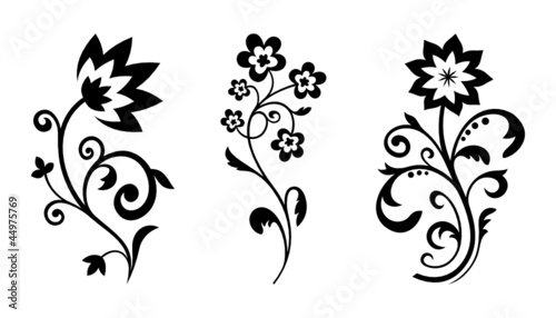 Silhouettes of abstract flowers. Vector floral design elements