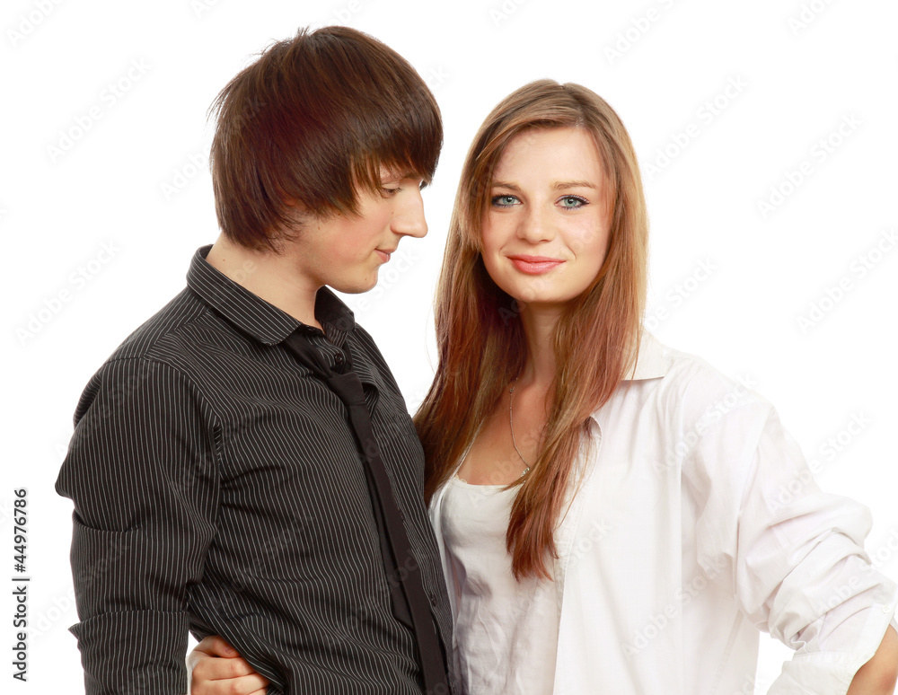 The man and the woman embrace. Isolated on the white background The man and the woman embrace. Isolated on the white background