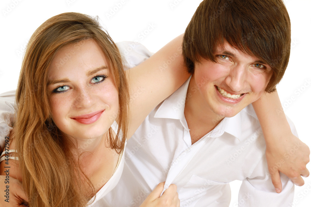 The man and the woman embrace. Isolated on the white background The man and the woman embrace. Isolated on the white background