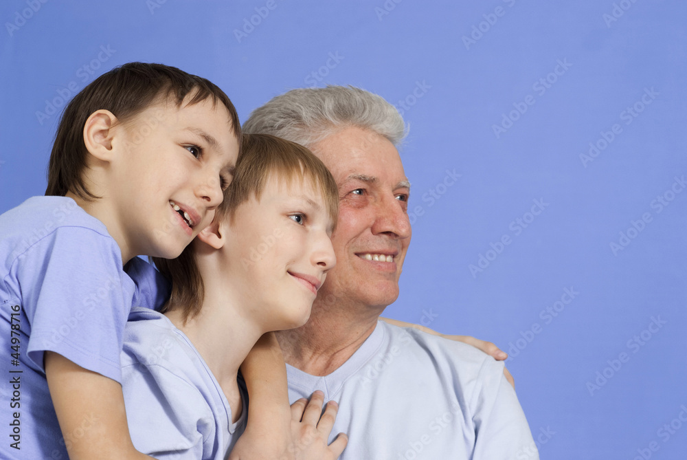 Happy Caucasian grandfather of two boys Happy Caucasian grandfather of two boys