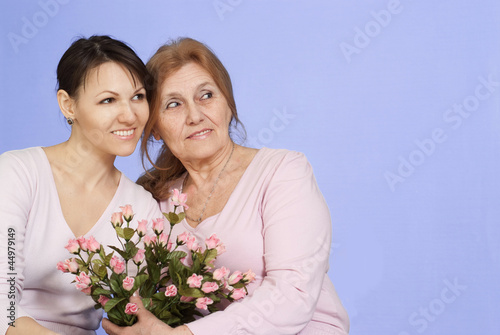 Happy Caucasian adult daughter with her mother