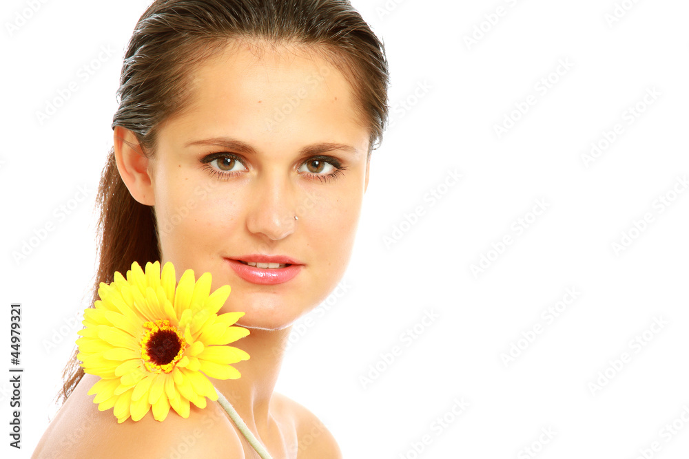 A young woman with a flower, isolated on white