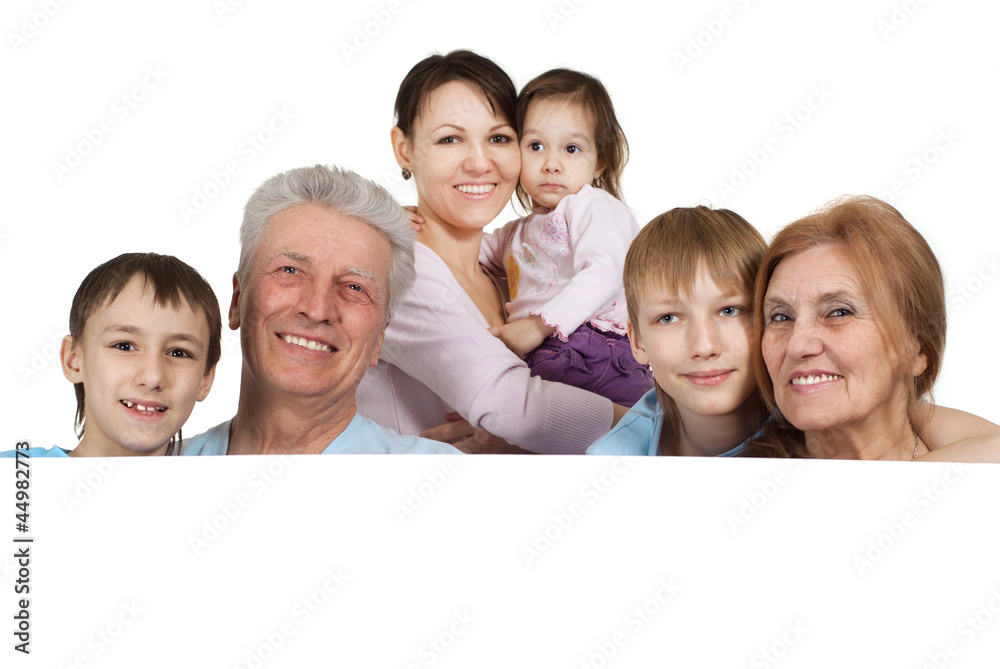 Happy Caucasian family of six people holding the paper Happy Caucasian family of six people holding the paper