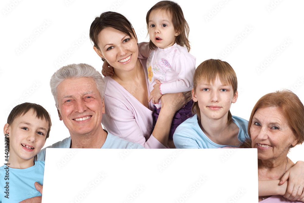 Happy Caucasian family of six people holding the paper Happy Caucasian family of six people holding the paper