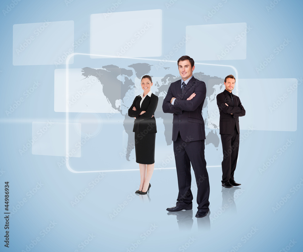 Business people standing in front of a map Business people standing in front of a map
